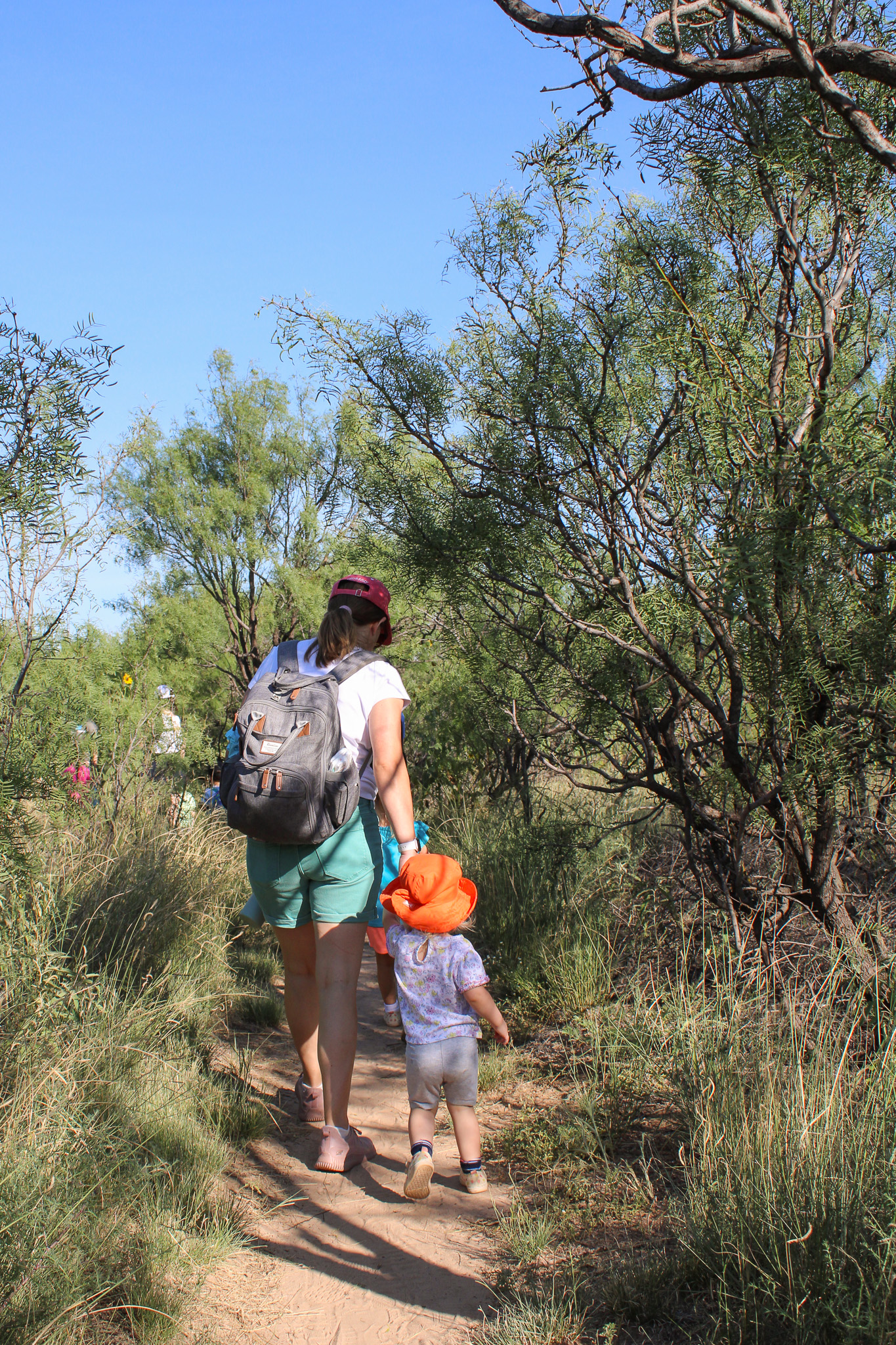 Toddler Tracks attendees hiking on teh wild kitten loop trail at Wildcat Bluff Nature Center, Amarillo, Texas