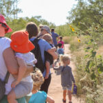 Toddler Tracks attendees hiking on teh wild kitten loop trail at Wildcat Bluff Nature Center, Amarillo, Texas