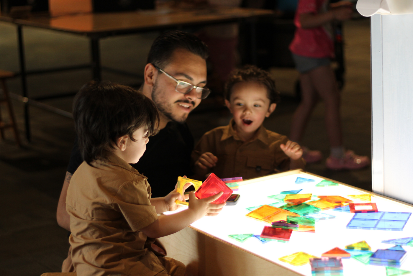 Don Harrington Discovery Center DHDC family playing together